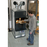 Adding fuel to a Fabbri heater installed in a Warehouse  | © Zeroridge